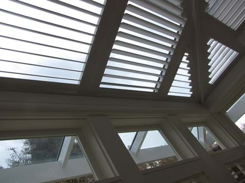 Reduce radiant heat yet allow natural light in with Atrium Louvre Blade Shutter Panel Screens
